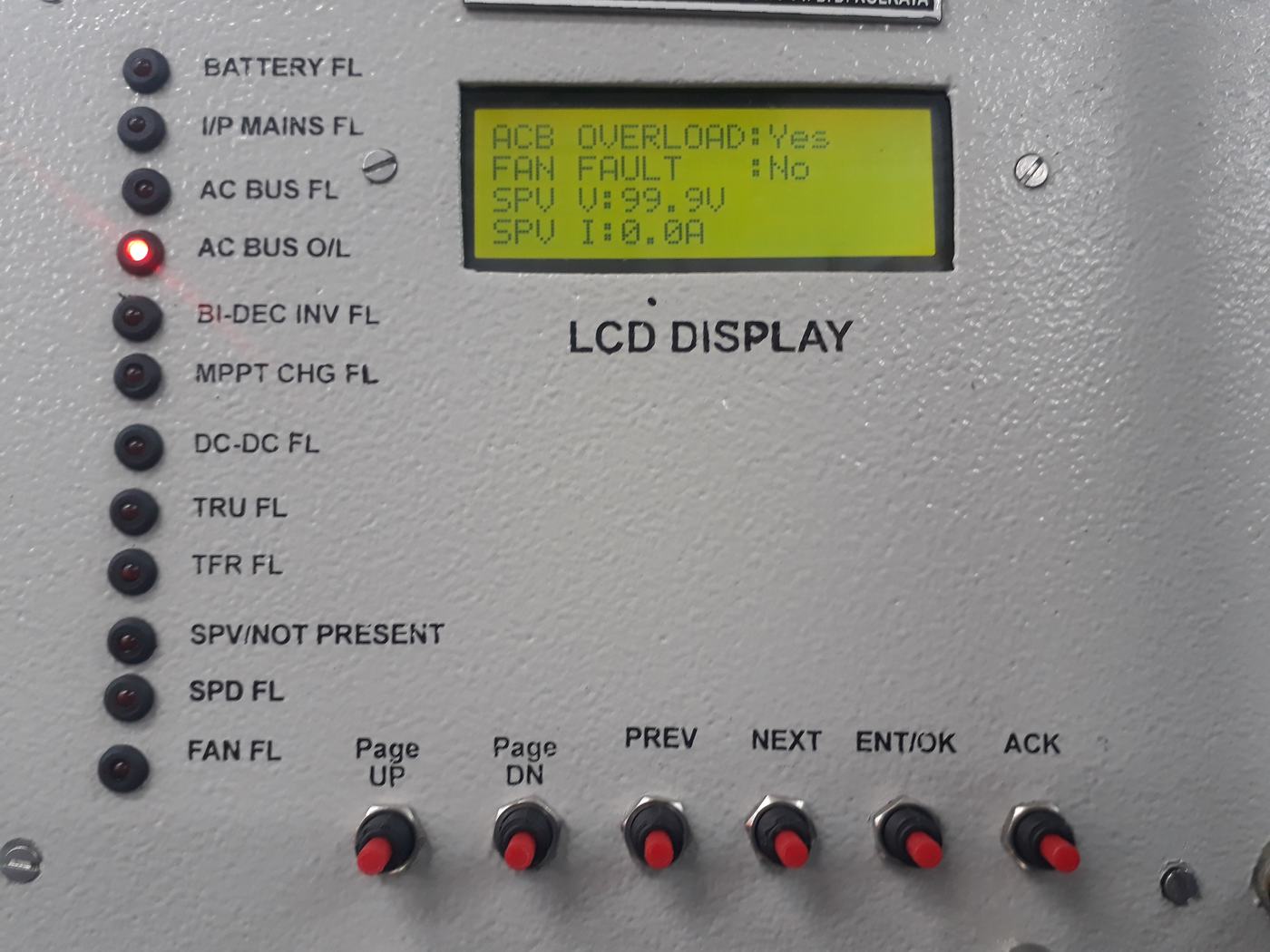 DSA panel with an LCD reading AC bus overload and a column of labelled fault LEDs